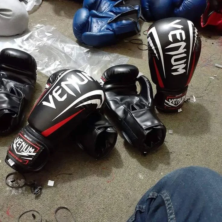 Rainwolf Sports production floor in Sialkot — combat sports equipment manufacturing